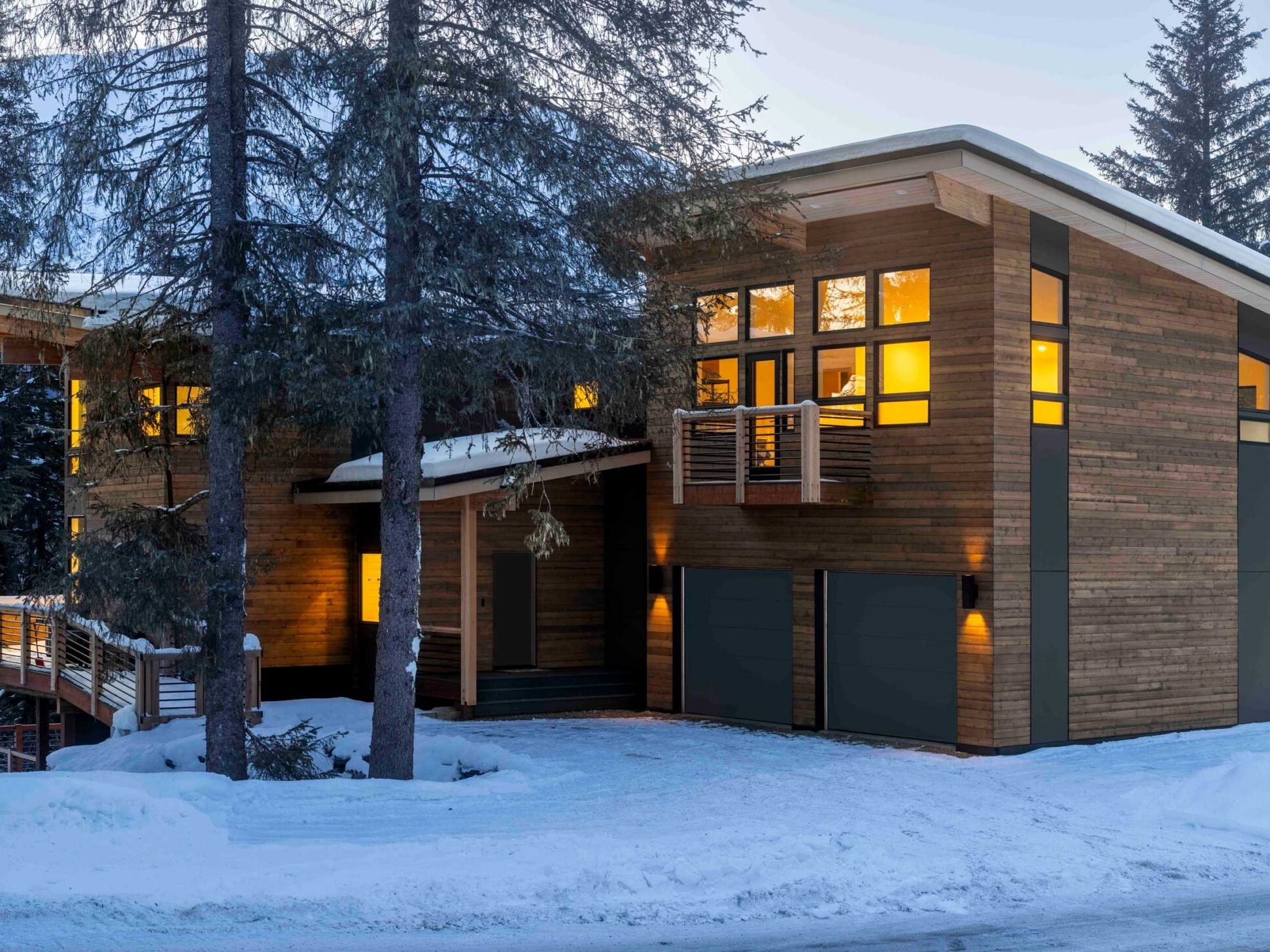 A home set in the trees on the hillside.