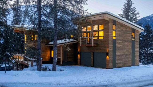 A home set in the trees on the hillside.